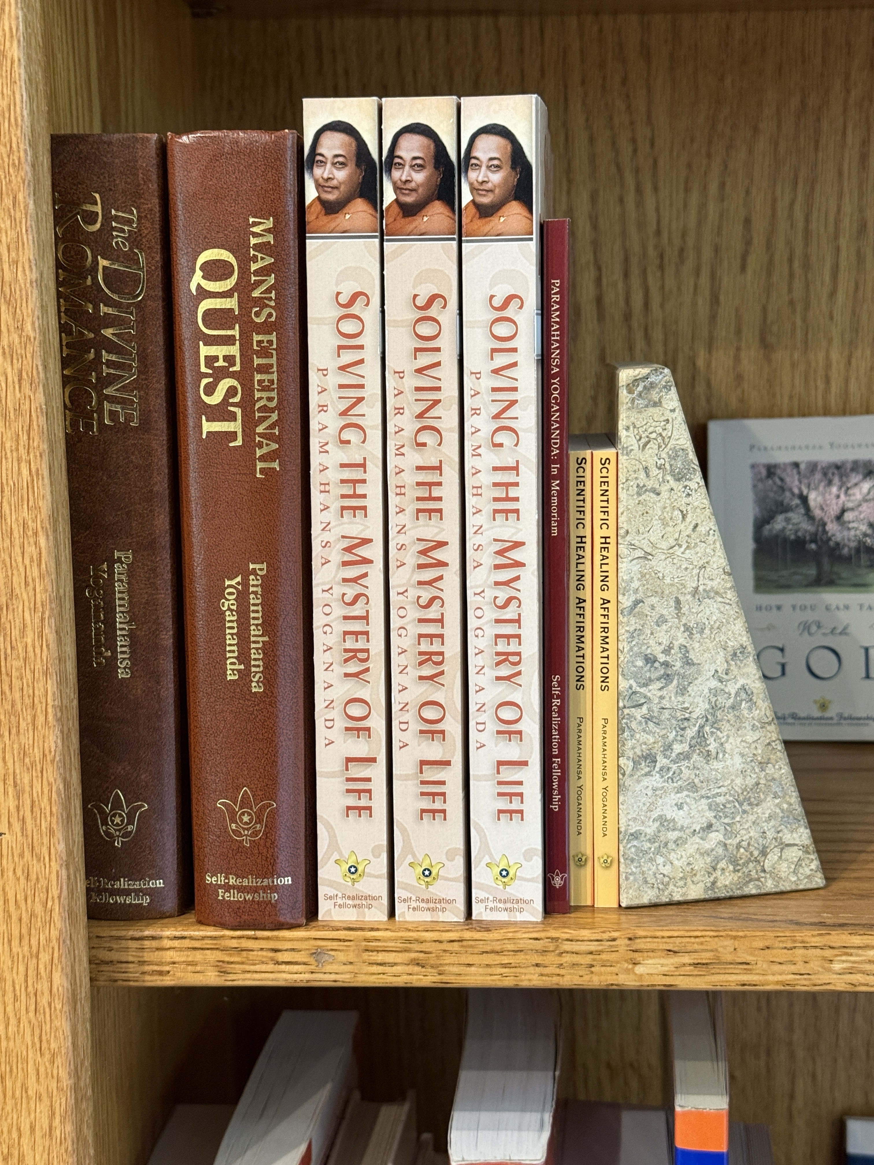 Paramahansa Yogananda titles and other Self-Realization Fellowship publications on a shelf